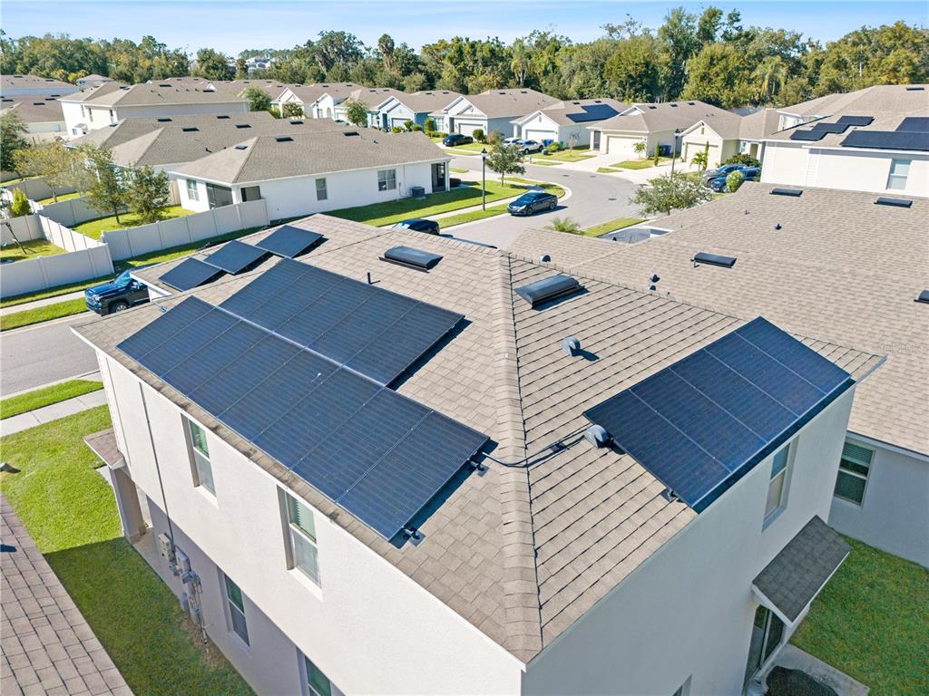 3090 Timber Hawk Circle Ocoee, FL 34761 - Photo 43 of 54 an aerial view of a house with a yard