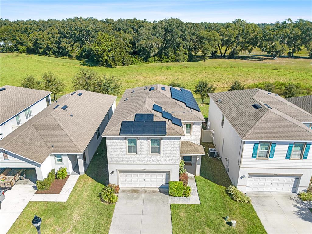 3090 Timber Hawk Circle Ocoee, FL 34761 - Photo 44 of 54 an aerial view of a house with a garden