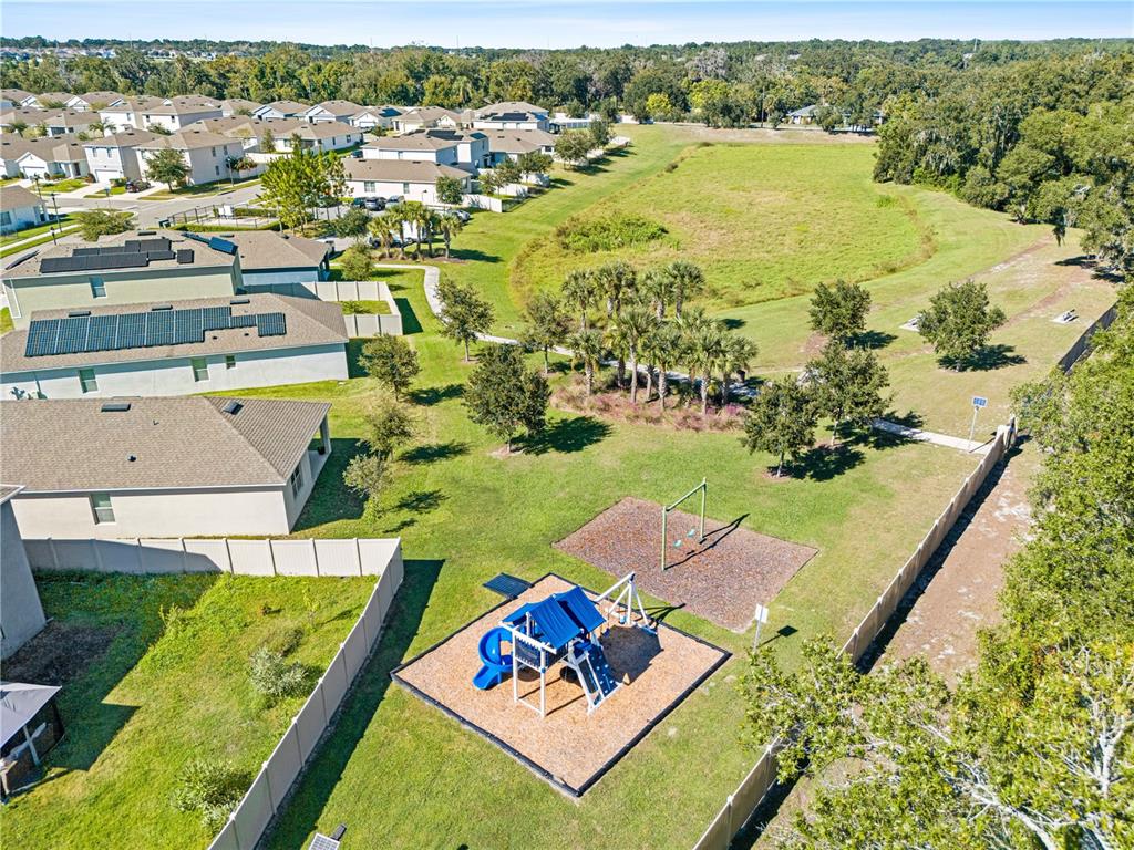 3090 Timber Hawk Circle Ocoee, FL 34761 - Photo 51 of 54 an aerial view of residential houses with outdoor space