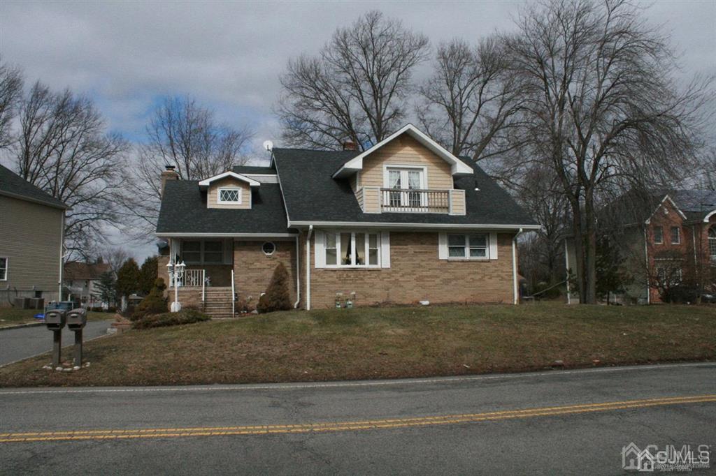 1120 New Dover Road Edison, NJ 08820 - Photo 1 of 9 a front view of a house with a yard
