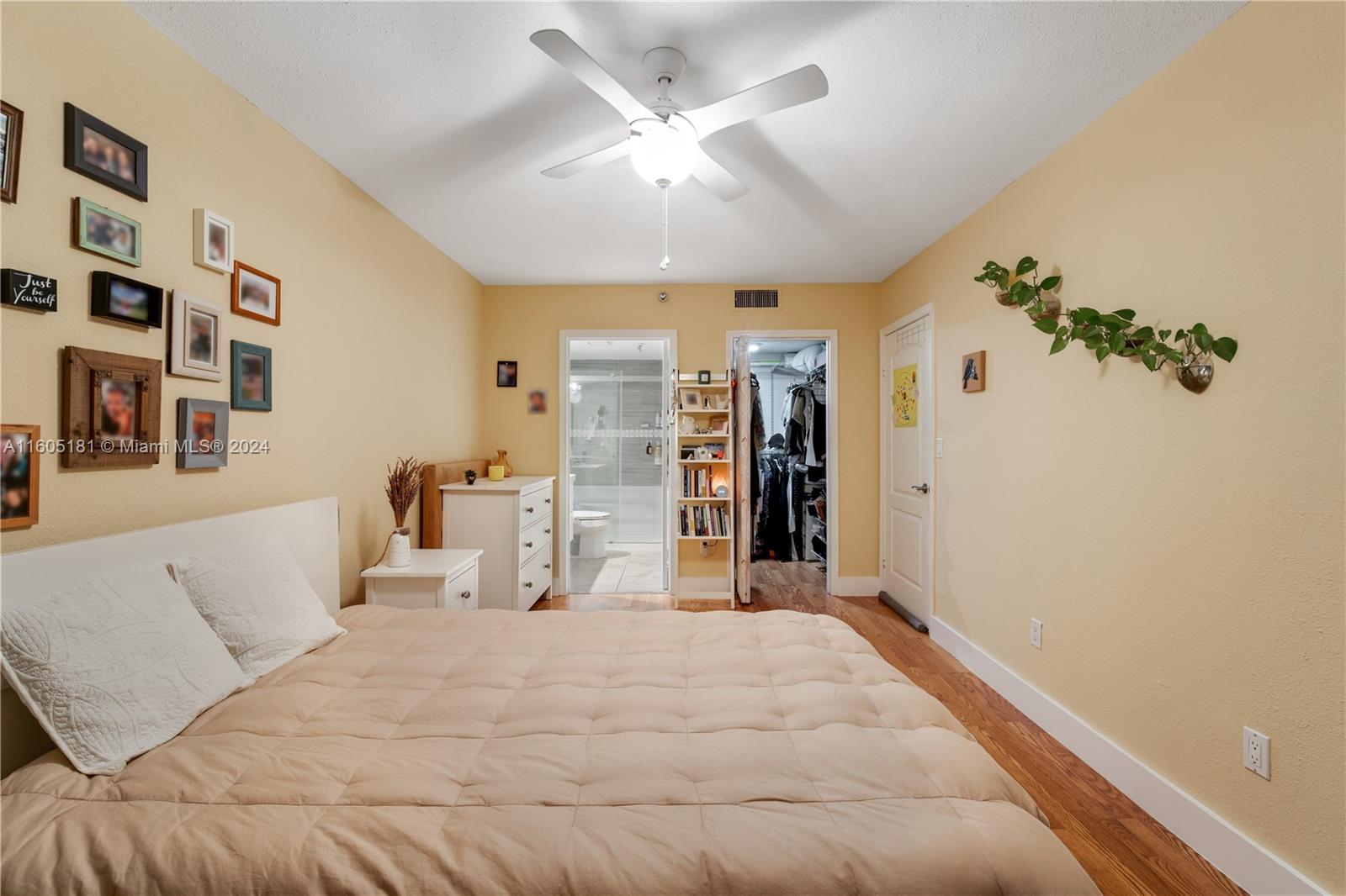 677 Northeast 24th Street, Unit 505 Miami, FL 33137 - Photo 11 of 30 a large white bed in a white bedroom