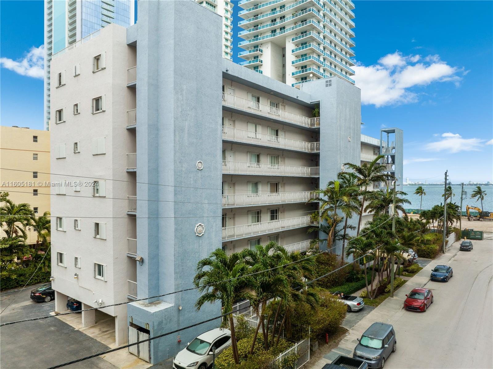677 Northeast 24th Street, Unit 505 Miami, FL 33137 - Photo 2 of 30 a potted plant sitting in front of a building