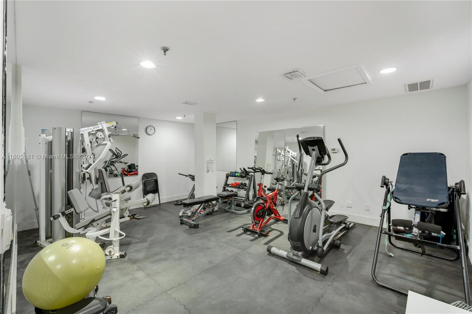 677 Northeast 24th Street, Unit 505 Miami, FL 33137 - Photo 22 of 30 a view of a room with gym equipment