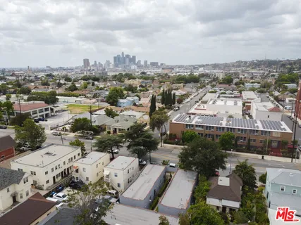 an aerial view of a city with lots of residential buildings