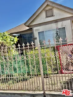 a front view of a house with a glass door
