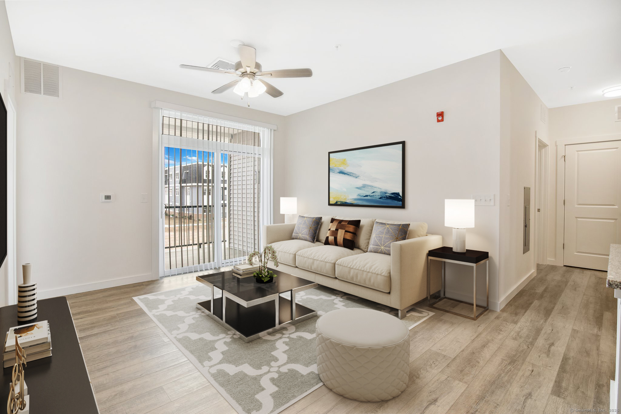 280 Salmon Brook Street, Unit 4306 Granby, CT 06035 - Photo 8 of 34 a living room with furniture and a large window