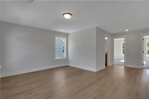 a view of a livingroom with wooden floor