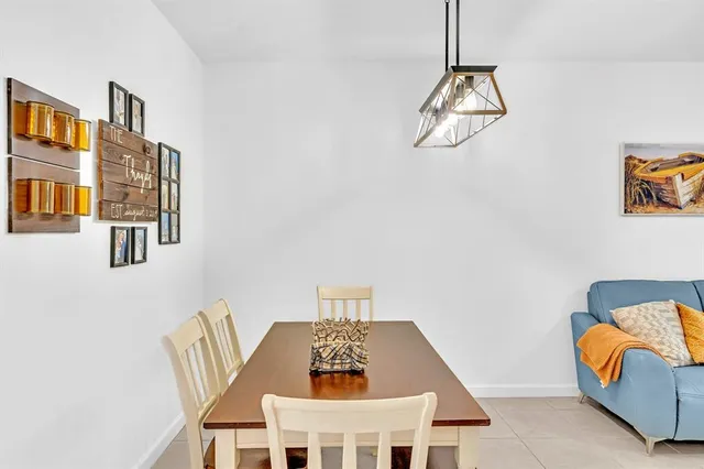 a view of a livingroom with furniture and furniture