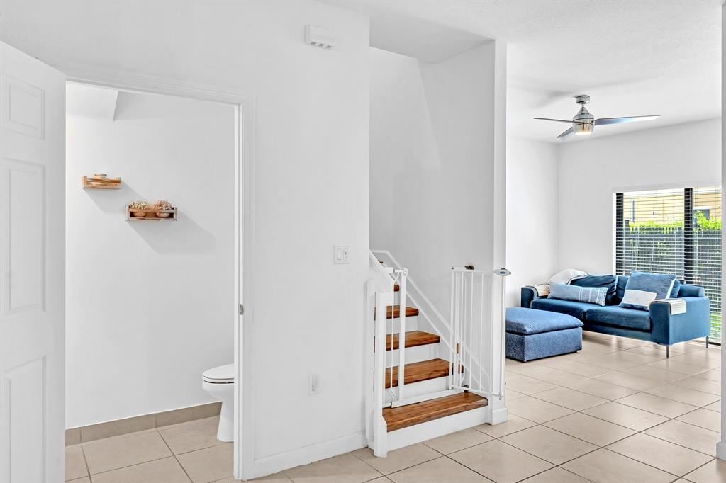 4668 Banker Terrace Davie, FL 33314 - Photo 16 of 52 a view of a livingroom with furniture and floor to ceiling window