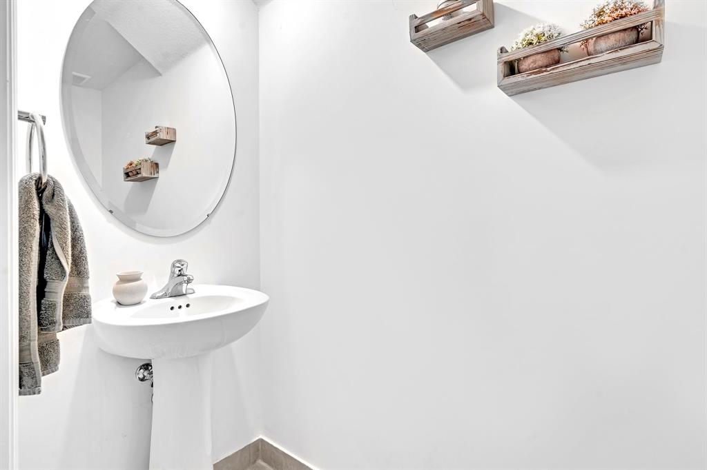 4668 Banker Terrace Davie, FL 33314 - Photo 17 of 52 a bathroom with a sink and a mirror