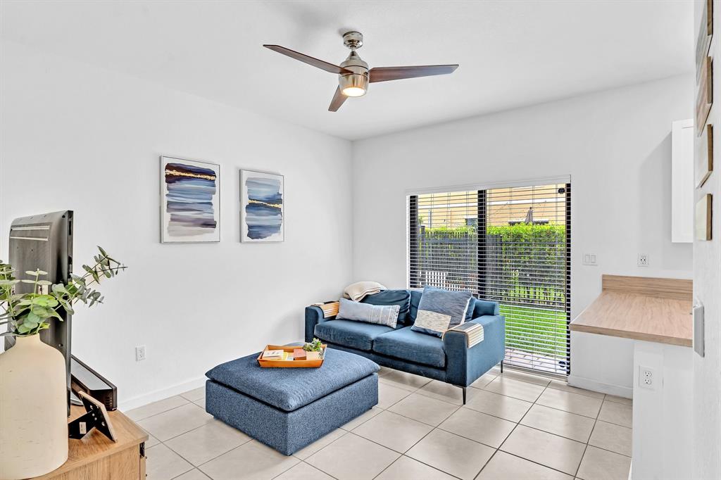 4668 Banker Terrace Davie, FL 33314 - Photo 19 of 52 a living room with furniture and a window