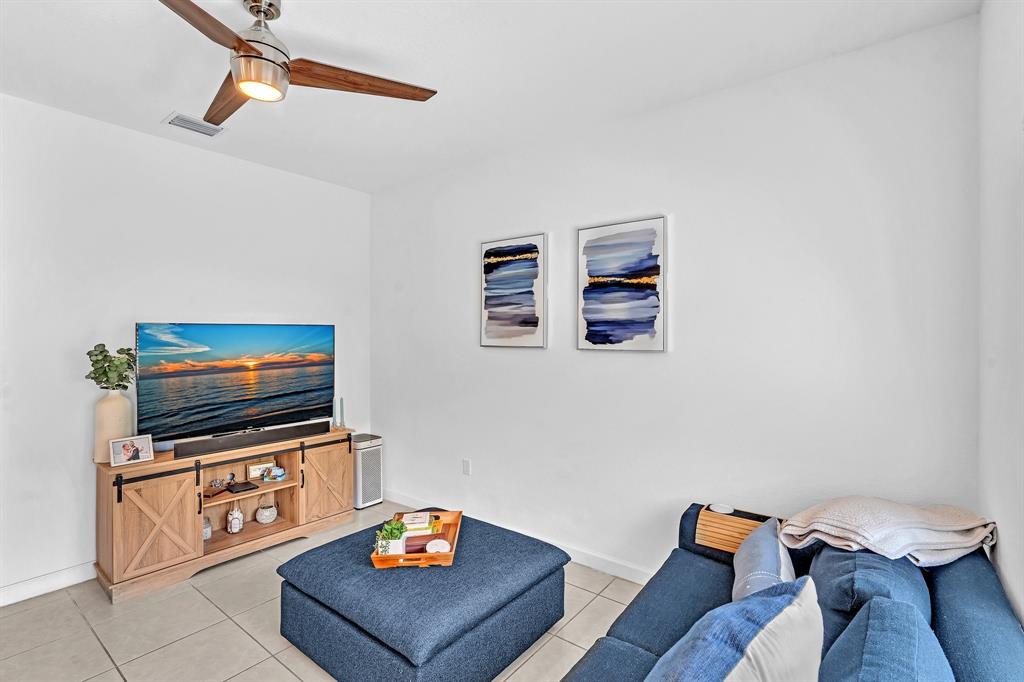 4668 Banker Terrace Davie, FL 33314 - Photo 21 of 52 a living room with furniture and a flat screen tv