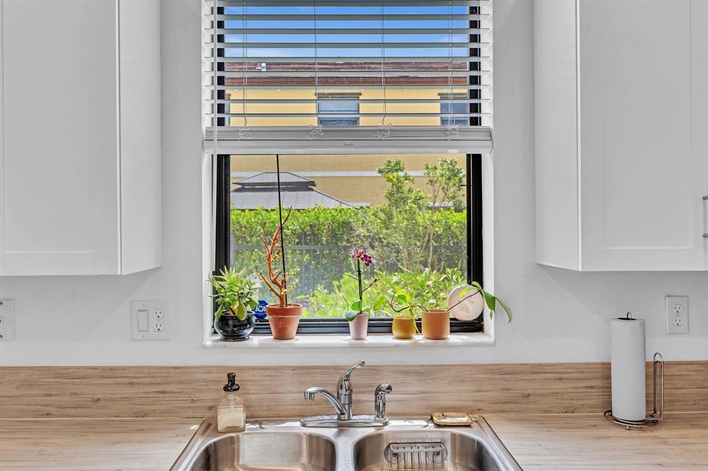 4668 Banker Terrace Davie, FL 33314 - Photo 26 of 52 a kitchen that has a sink and a window