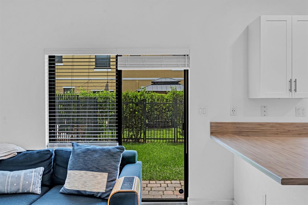 4668 Banker Terrace Davie, FL 33314 - Photo 31 of 52 a living room with furniture and a window