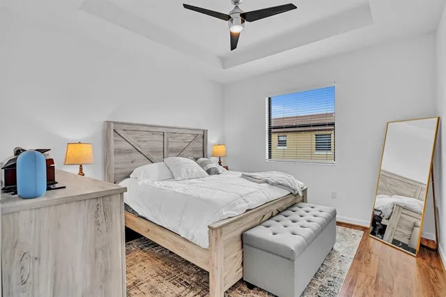 a bedroom with a bed and a cabinets