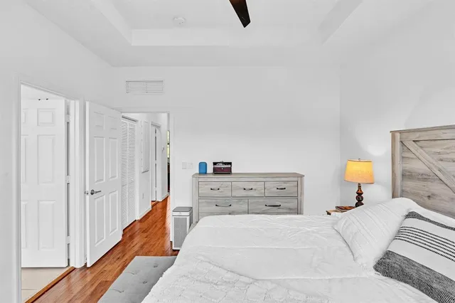 a bathroom with double sink and a mirror