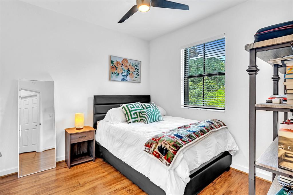 4668 Banker Terrace Davie, FL 33314 - Photo 41 of 52 a bedroom with a bed a dresser and a window