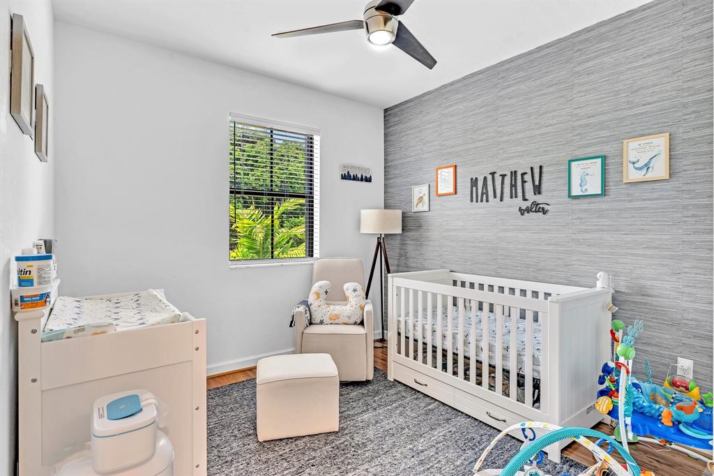 4668 Banker Terrace Davie, FL 33314 - Photo 45 of 52 a bedroom with a bed and a window