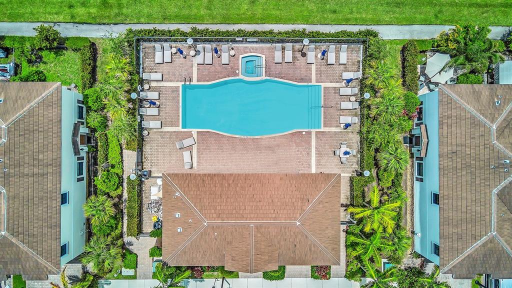 4668 Banker Terrace Davie, FL 33314 - Photo 51 of 52 an aerial view of a house with a garden and trees