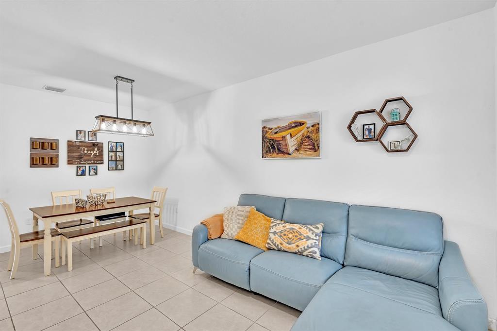 4668 Banker Terrace Davie, FL 33314 - Photo 7 of 52 a living room with furniture and a piano