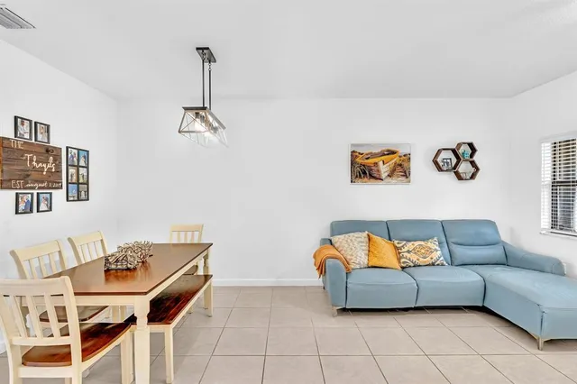 a living room with furniture and a couch