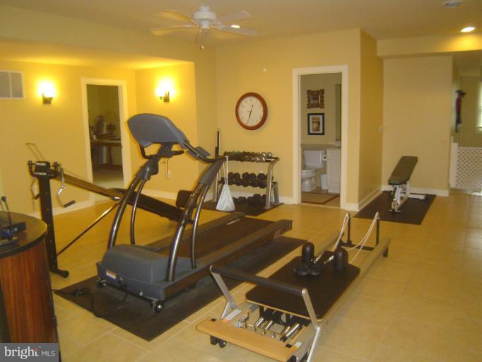 4908 Round Hill Road Frederick, MD 21702 - Photo 22 of 24 a room with gym equipment