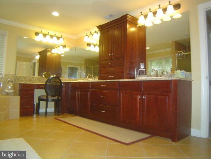 4908 Round Hill Road Frederick, MD 21702 - Photo 4 of 24 a kitchen with a sink and cabinets
