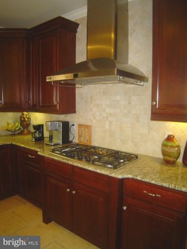 4908 Round Hill Road Frederick, MD 21702 - Photo 9 of 24 a kitchen with sink and cabinets