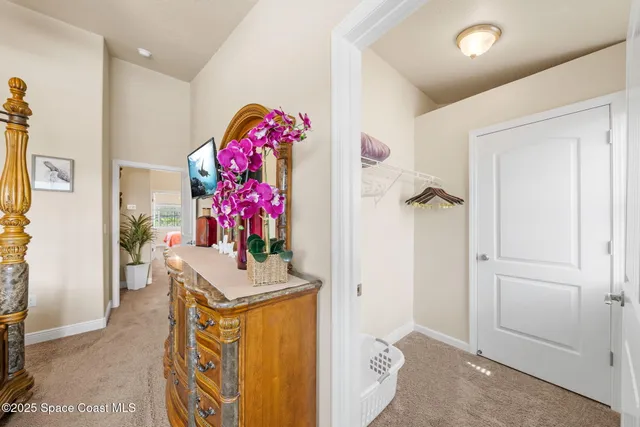 a bathroom with a granite countertop shower a sink and a mirror