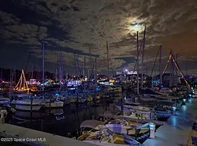 a view of a swimming pool with outdoor seating