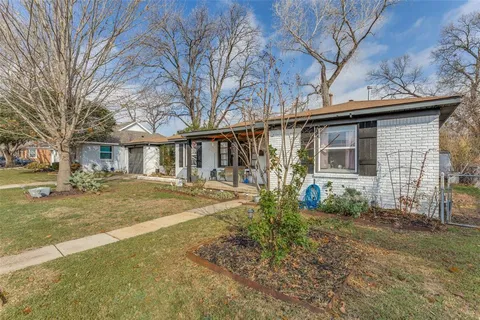 a house that has a lot of plants in it