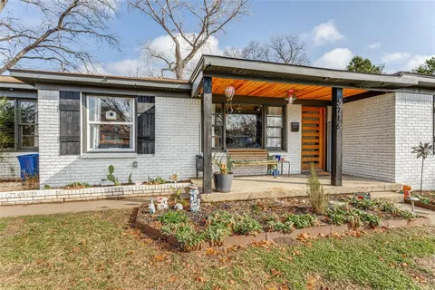 a view of swimming pool with outdoor seating