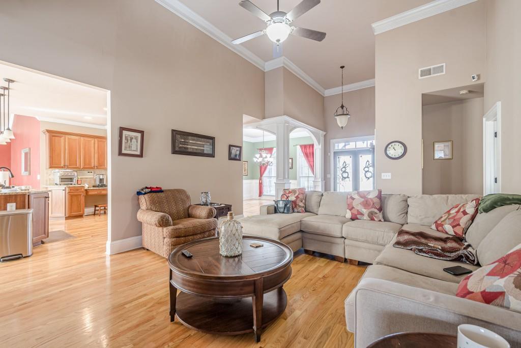 1765 Dew Place Southwest Marietta, GA 30064 - Photo 11 of 61 a living room with furniture and a large window