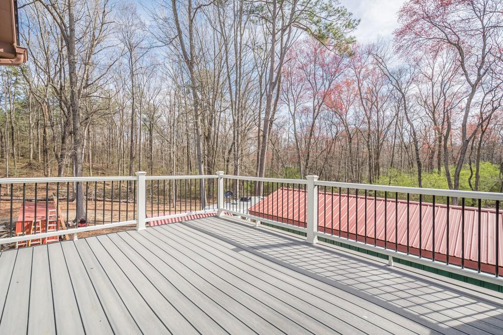 1765 Dew Place Southwest Marietta, GA 30064 - Photo 20 of 61 a view of a wooden roof with wooden floor and fence