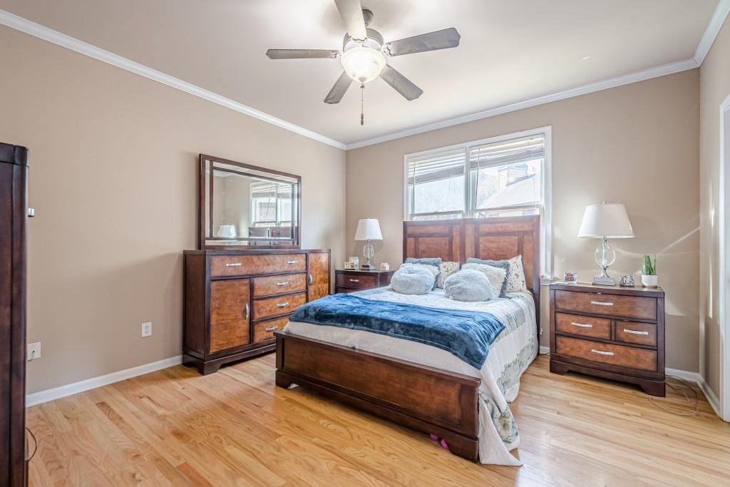1765 Dew Place Southwest Marietta, GA 30064 - Photo 32 of 61 a bedroom with a bed and a dresser
