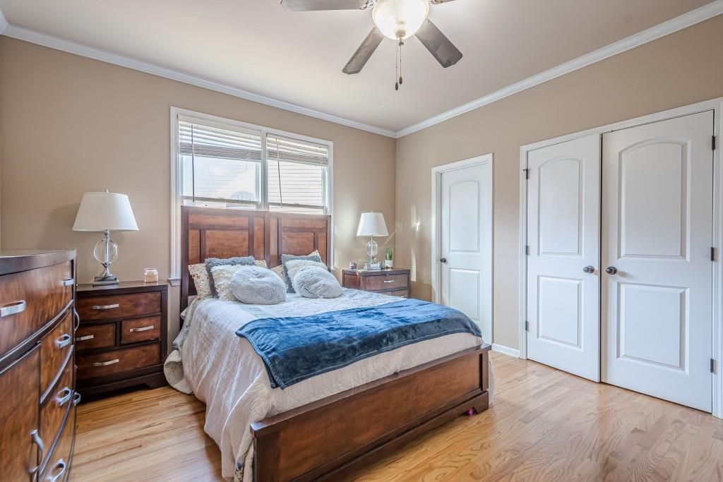 1765 Dew Place Southwest Marietta, GA 30064 - Photo 33 of 61 a bedroom with a large bed and a window