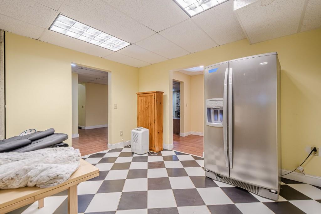 1765 Dew Place Southwest Marietta, GA 30064 - Photo 47 of 61 a view of a livingroom with a black and white checkered floor