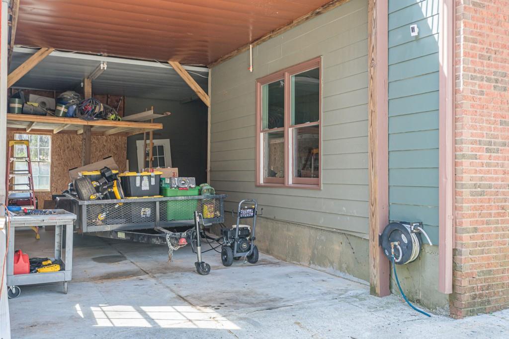 1765 Dew Place Southwest Marietta, GA 30064 - Photo 54 of 61 a view of a house with patio