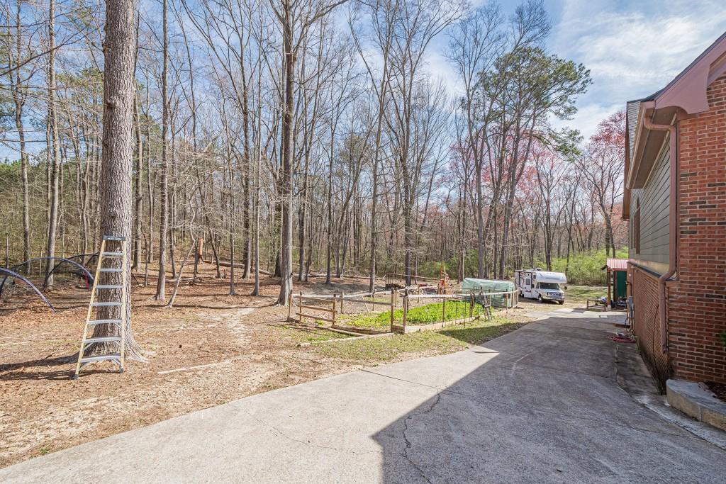 1765 Dew Place Southwest Marietta, GA 30064 - Photo 55 of 61 a view of swimming pool with chairs