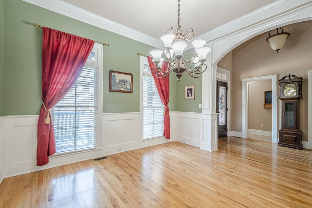 1765 Dew Place Southwest Marietta, GA 30064 - Photo 8 of 61 a view of a livingroom with wooden floor and stairs