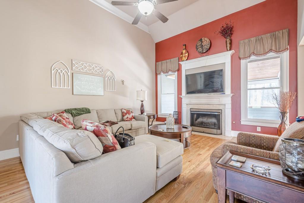 1765 Dew Place Southwest Marietta, GA 30064 - Photo 9 of 61 a living room with furniture and a fireplace