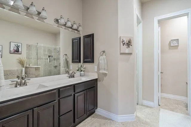 a bathroom with a bathtub and shower