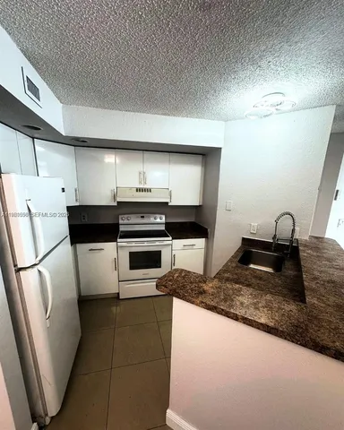 $219,000 | 12760 Vista Isles Drive, Unit 715, Sunrise, FL 33325