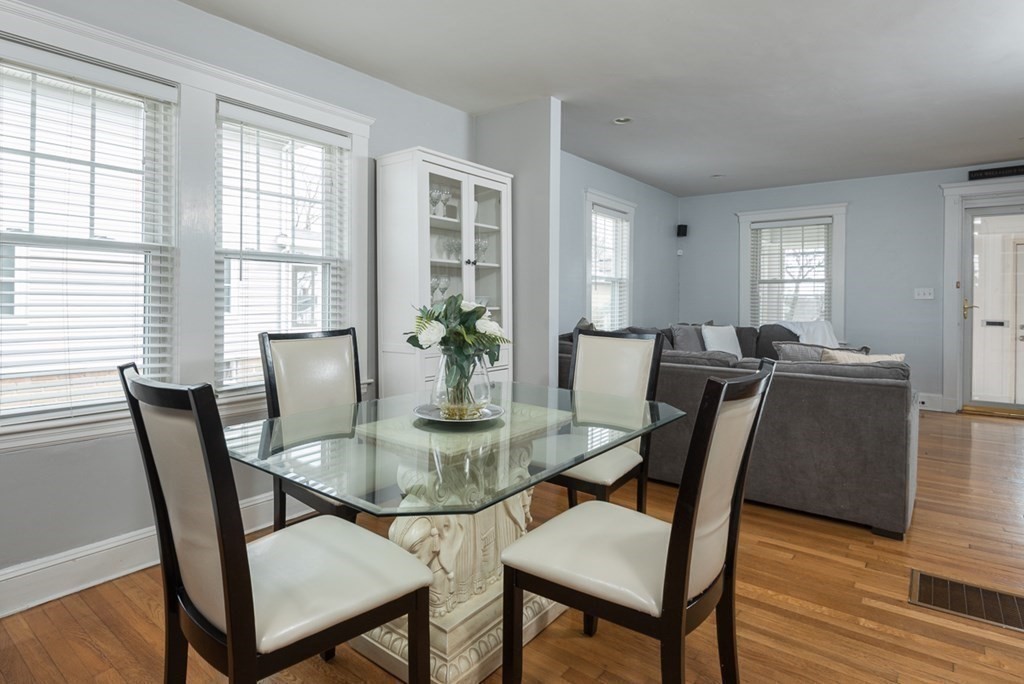 39 Edgemont Road Braintree, MA 02184 - Photo 17 of 39 a view of a dining room with furniture and wooden floor