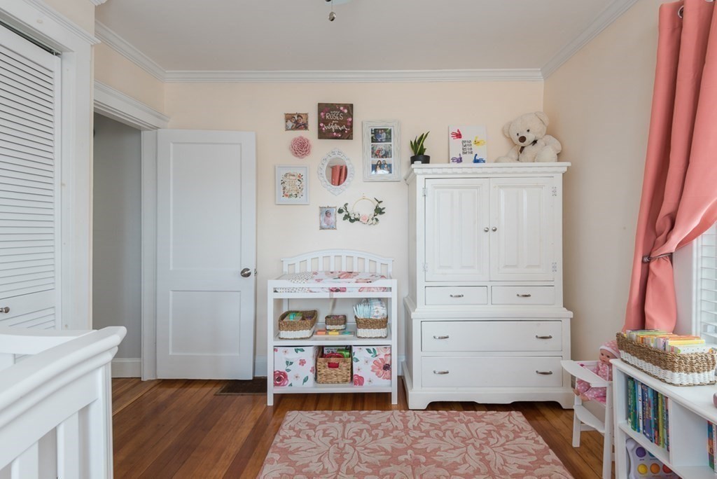 39 Edgemont Road Braintree, MA 02184 - Photo 23 of 39 a view of bedroom with furniture and wooden floor