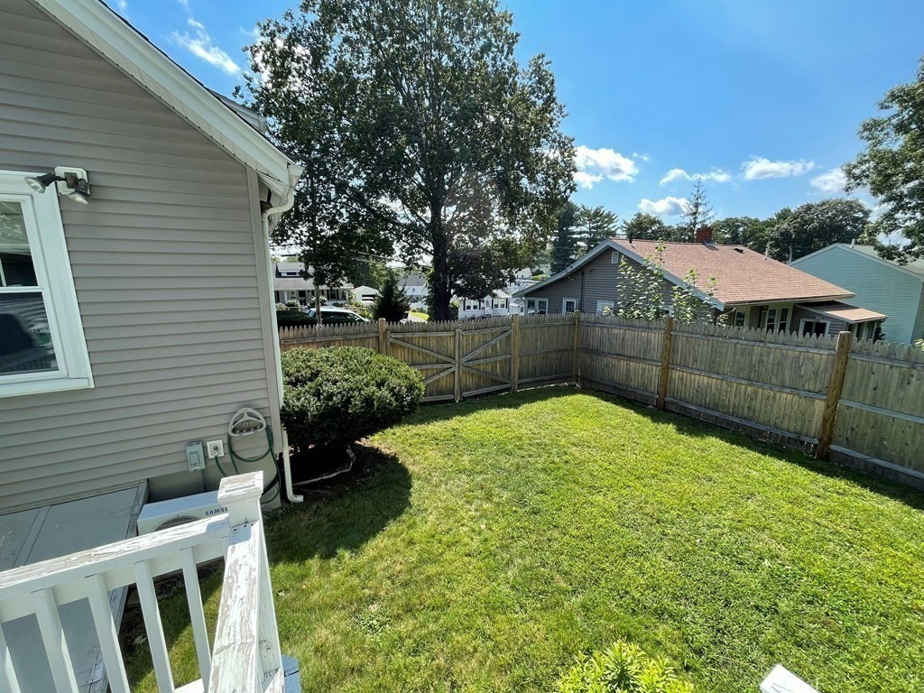 39 Edgemont Road Braintree, MA 02184 - Photo 34 of 39 a view of a backyard with a garden