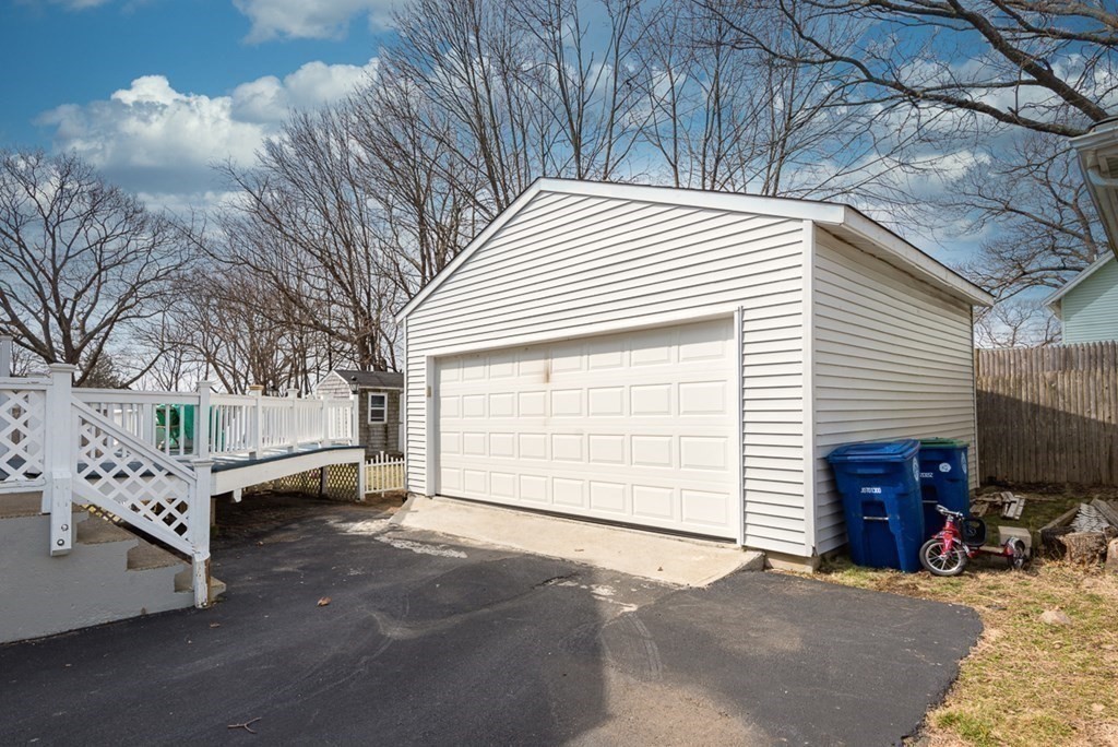 39 Edgemont Road Braintree, MA 02184 - Photo 37 of 39 a view of a house with a yard and garage