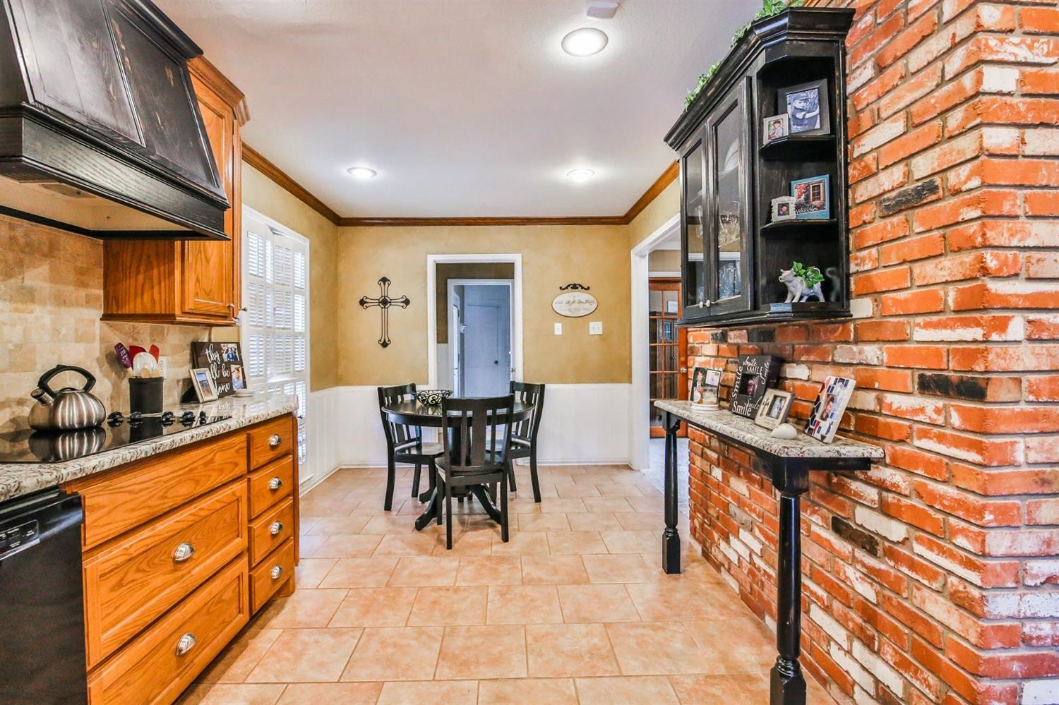 3204 55th Street Lubbock, TX 79413 - Photo 12 of 41 a view of a kitchen with furniture and window