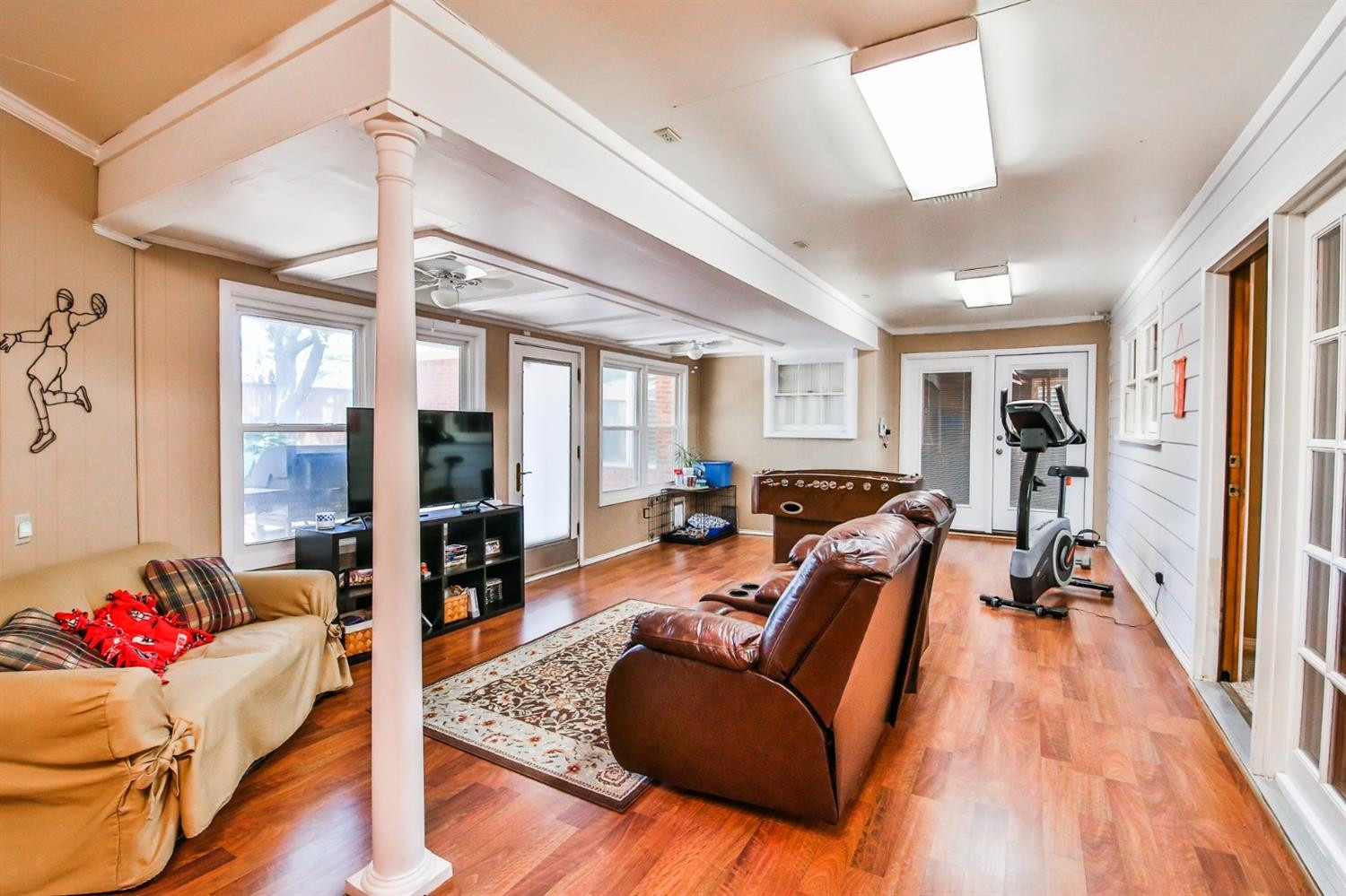 3204 55th Street Lubbock, TX 79413 - Photo 16 of 41 a living room with furniture and a wooden floor