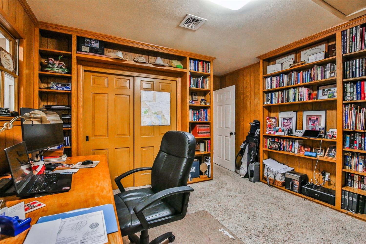 3204 55th Street Lubbock, TX 79413 - Photo 18 of 41 a view of a workspace with furniture and toys